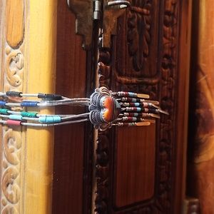 Liquid silver necklace with heart shaped multi stoned inlain